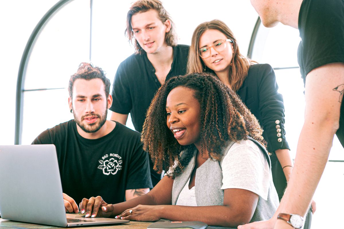 Hiring team reviewing a verified candidate report together